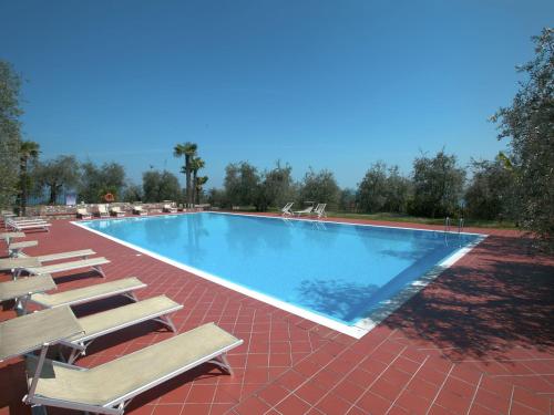 Piscina, Comfortable holiday home in Soiano del lago with lakeview in Soiano del Lago