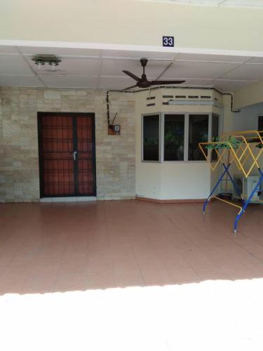 a room with a blue door and a blue floor, KERAI GUEST HOUSE TEMERLOH in Temerloh