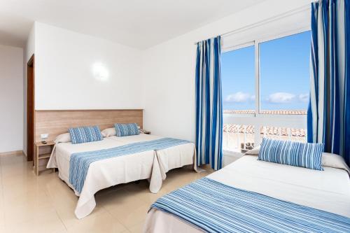 Chambre triple, 3 lits