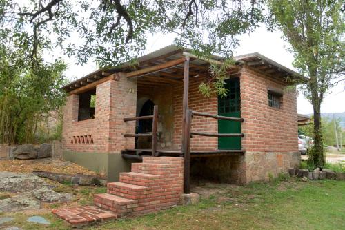 LA TOMA Complejo de Montaña - Cabañas y Habitaciones en Hosteria