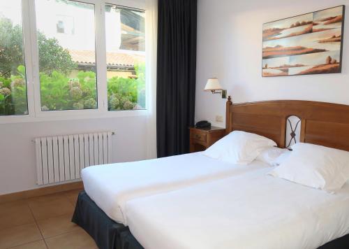 Habitación 2 camas, vistas al jardín