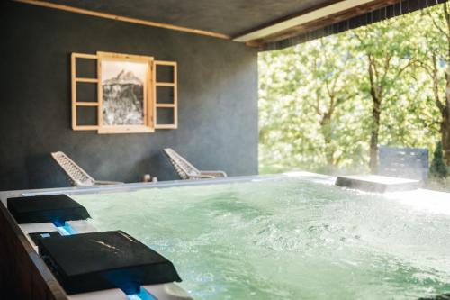 Swimming pool, Les Dolomites Mountain Lodges in San Martino In Badia