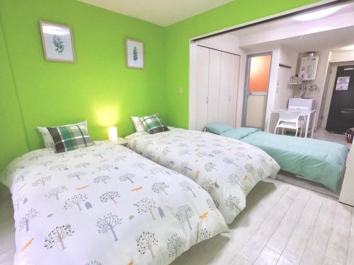 Hotel Flourish 67 Room Type - One-Bedroom Apartment