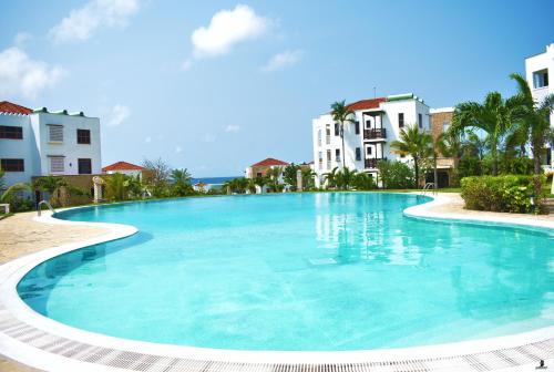 Sultan Palace Beach Resort - AMANI Apartment CB2-202 – khách sạn tại Kanamai