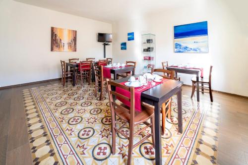 zonă comună salon/TV, B&B Alma in Lucca