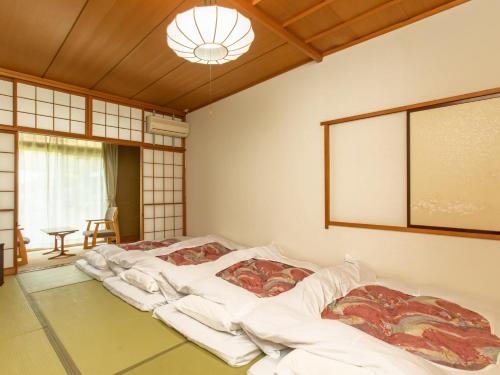 Japanese-Style Quadruple Room with Shared Bathroom - Non-Smoking