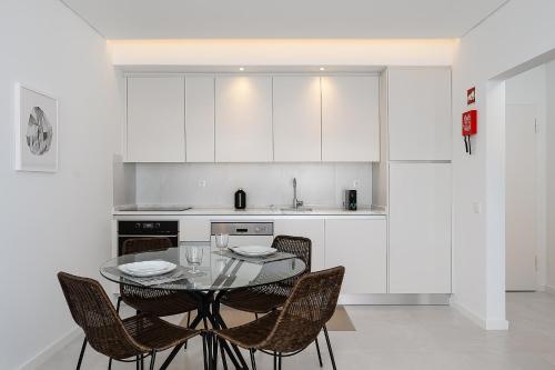 White Ocean Home by Real Life Concierge