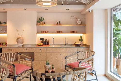 Shared lounge/TV area, the Figo near Kennedy Town MTR Station