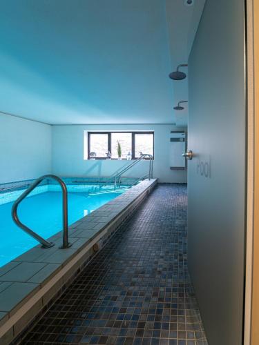 Piscină, Tom's Hus Heiligenhafen in Heiligenhafen