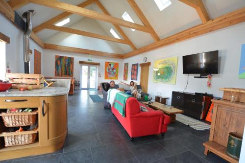 Shared lounge/TV area, Glamping Yurts near Newquay in Colan