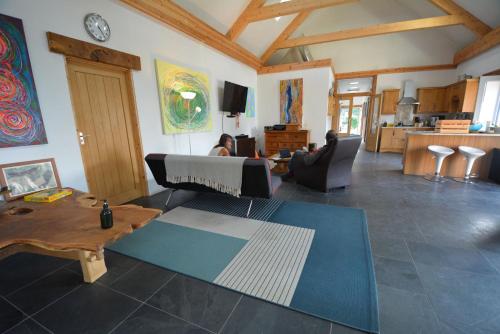 Shared lounge/TV area, Glamping Yurts near Newquay in Colan