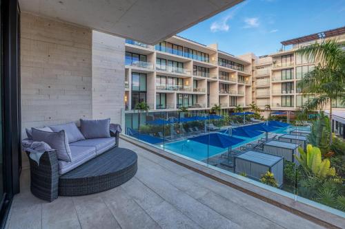 Astonishing Condo with balcony in a private complex with pool and gym