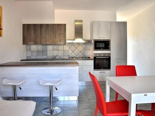 Modern Apartment in Loiri Italy with Pool