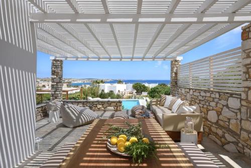 Amalgam Homes Paros Zefyros | Sea View Private Pool Villa in อัมเปลัส