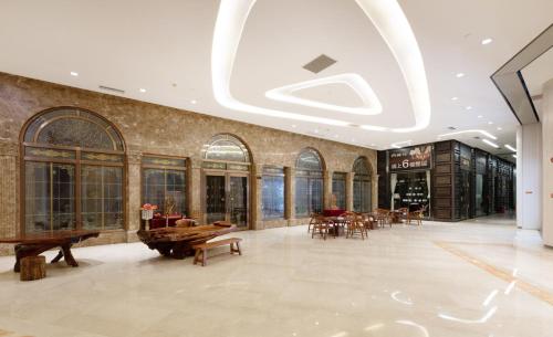 Közös társalgó / TV, yinquan hotel in Csungcsan