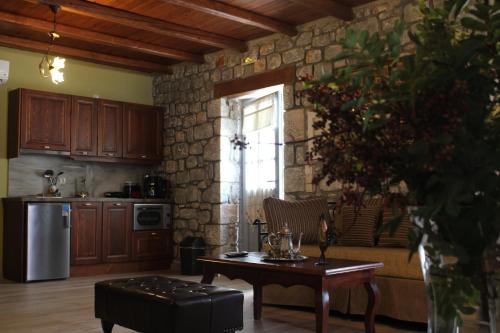 virtuve, Εn Plo Luxury Suites in Oitilo