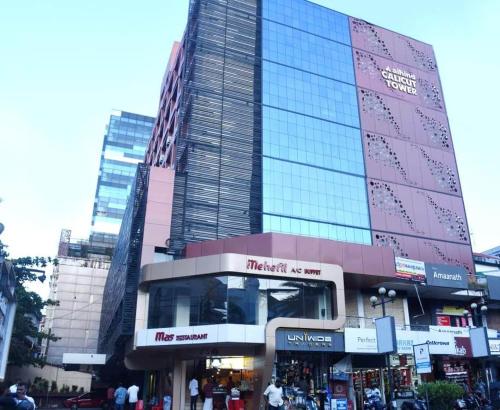 Alhind Calicut Tower Set in a prime location of Kozhikode / Calicut, Alhind Calicut Tower puts everything the city has to offer just outside your doorstep. The property offers guests a range of services and amenities desi