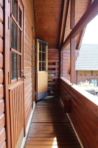 Erkély/terasz, Holzhaus am Silbersee in Frielendorf