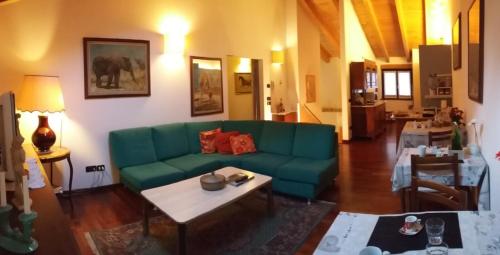 zonă comună salon/TV, B&B Le Muse in Trento