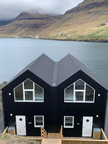 כניסה, Panorama boathouse in Klaksvík
