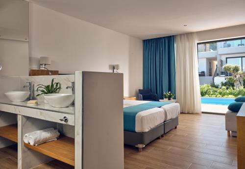 Cavo Orient Beach Hotel & Suites - image 14