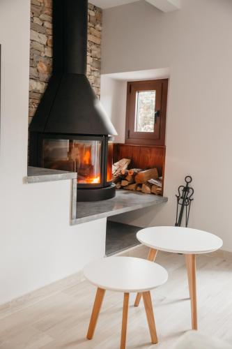 Koplietošanas atpūtas telpa ar TV, Apartaments Rurals Cala Palmira in Alpens