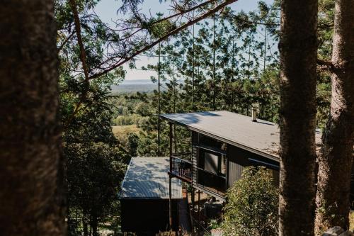 Rainforest Gardens - Luxury Hillside Chalets with Views to Bay & Islands