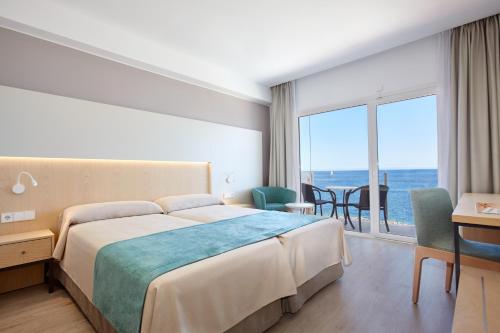 Quarto twin, lado do mar