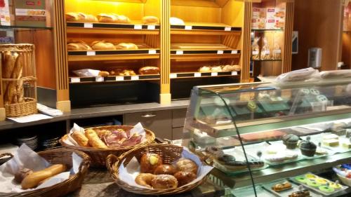 餐廳, 梅爾查特萊蘭酒店 (Le Merle Chatelain) in 錫永