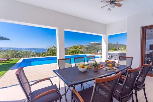 Villa Flora with a 53 sqm private pool with Cinema room with projector and 4 en-suite bedrooms - main image