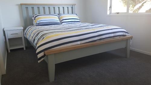 Karoro the beach front bach with views to die for! in Otorohanga