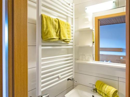Cosy apartment with terrace and garden access in a quiet wooded area