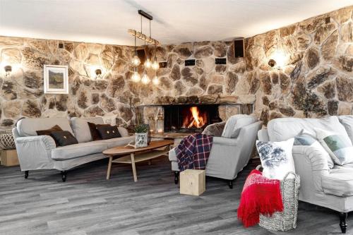 Aufenthaltsraum/TV-Zimmer, Fossheim Lodge - arealeffektiv minileilighet in Geilo