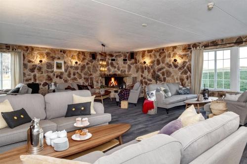 Aufenthaltsraum/TV-Zimmer, Fossheim Lodge - arealeffektiv minileilighet in Geilo