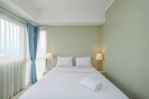 Comfortable and Spacious 2BR at Oasis Cikarang Apartment By Travelio, Cikarang