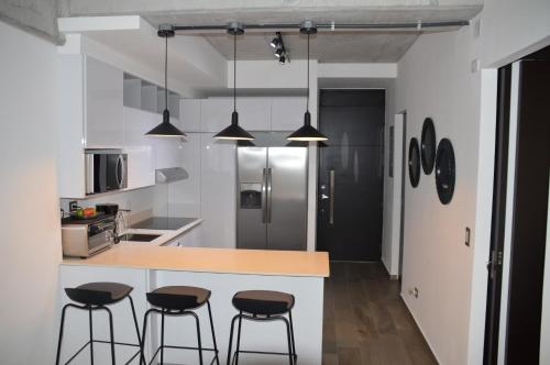 Cocina, Cozy Stays Cayala Apartments 2 in Zona 16