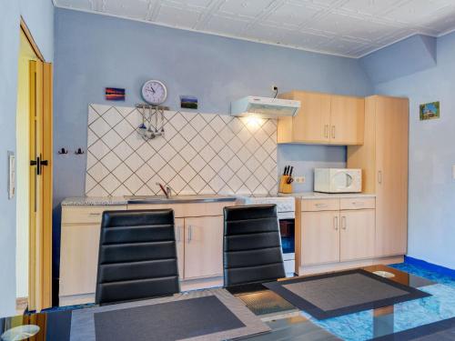 virtuve, Charmante Ferienwohnung für 2 Personen mit Garten (Charmante Ferienwohnung fur 2 Personen mit Garten) in Am Salzhaff