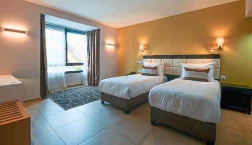 Twin Room room in Samsara Hotel
