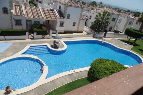  Stunning Penthouse Apartment in Villamartin with Communal Pool in Villamartin