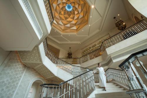Shared lounge/TV area, Four Seasons Resort Dubai at Jumeirah Beach near Miramin Al Wasl