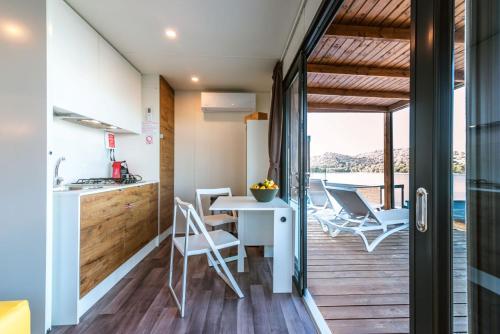 Luxury couple camping villa with kitchenette and sea view terrace