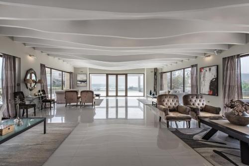 gedeelde lounge/tv-ruimte, GARDELLI RESORT in Laganas