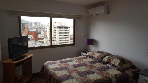 Guestroom, Apartosuites cerca del Boulevar de Sabana Grande y la Av. Solano in Caracas