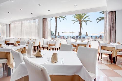 餐廳, 因佩里奧海灘格魯波特爾酒店 (Grupotel Imperio Playa) in 聖胡安包蒂斯塔