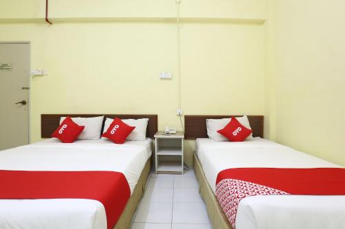 кровать, Super OYO 89651 Harmoni Hotel in Кота-Бару