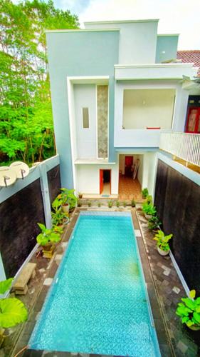 Foto - RedDoorz At Artomoro Guest House