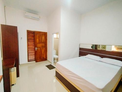 RedDoorz At Artomoro Guest House – Sleman, MN