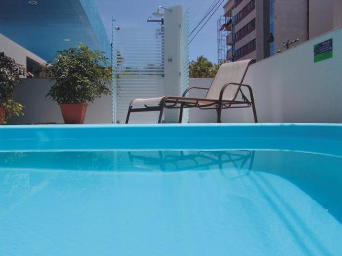 Swimming pool, Coqueiros Express Hotel in Ponta Verde