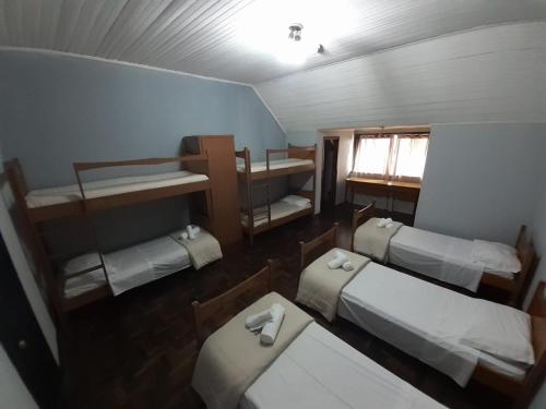 1 double bed, 3 twin beds, 1 bunk bed