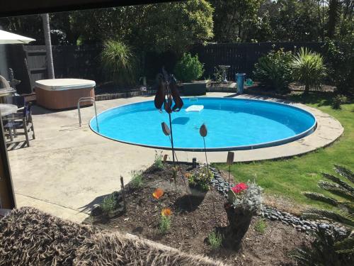 Swimming pool, Norfolk Gardens Bed and Breakfast in Te Kopuru
